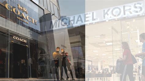 michael kors merger